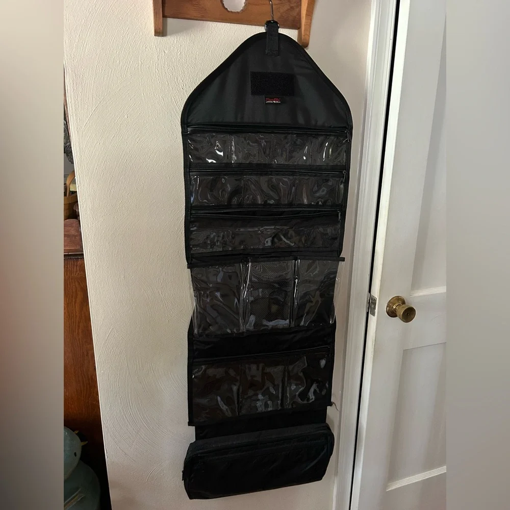 Folding Hanging Organizer, makeup, storage or travel bag. Very lg, many sections